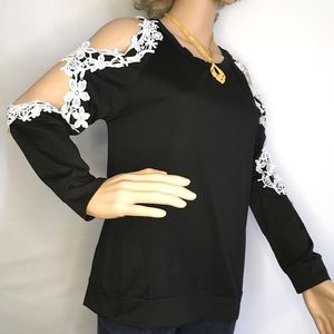 Black cold shoulder shirt with white lace.